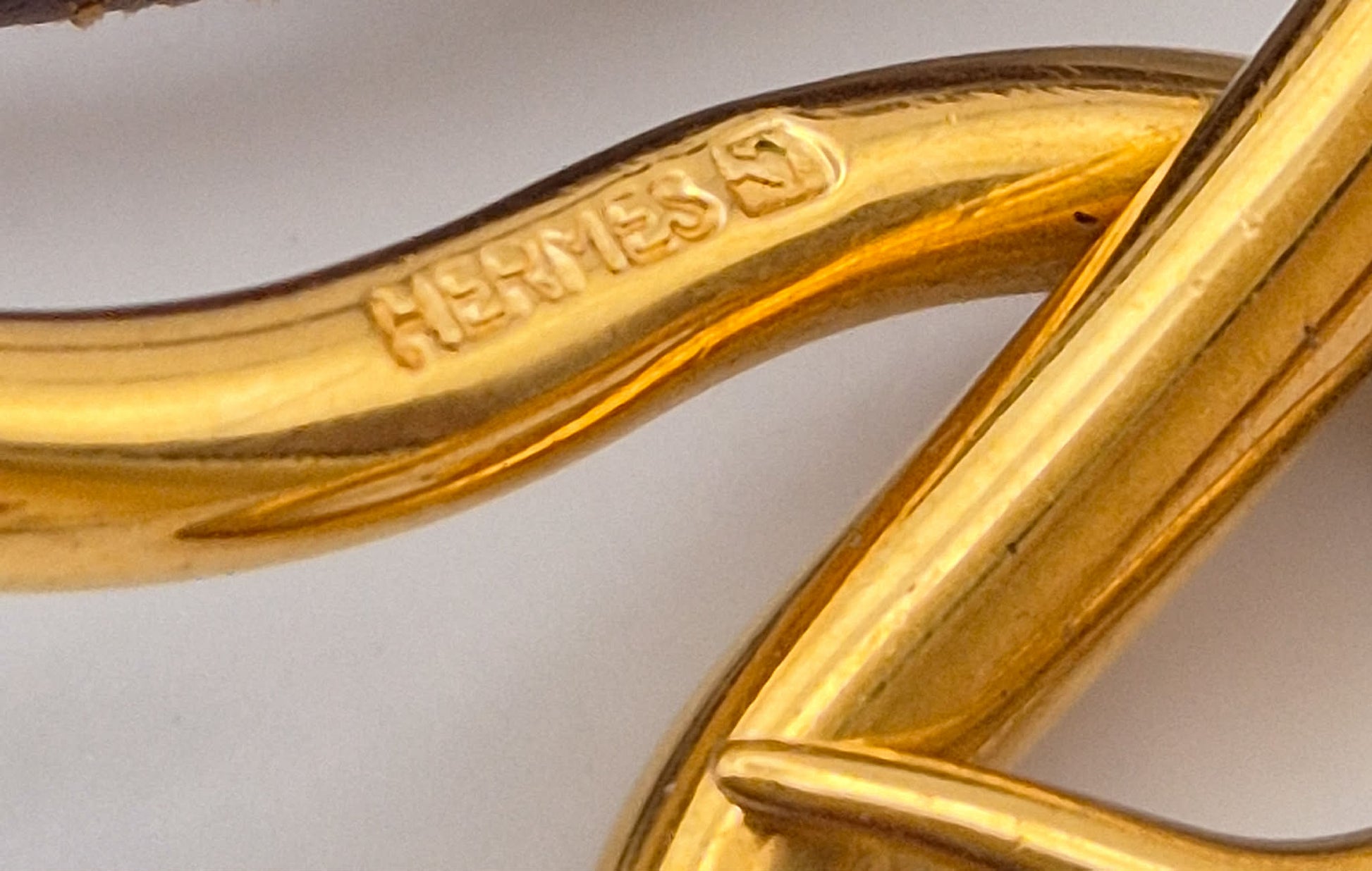Hermès antspaudas ant kabliuko