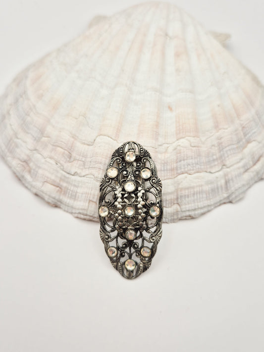 Vintažinis sidabrinis ažūrinis dress klipsas su skaidriais rhinestones (Art Deco)