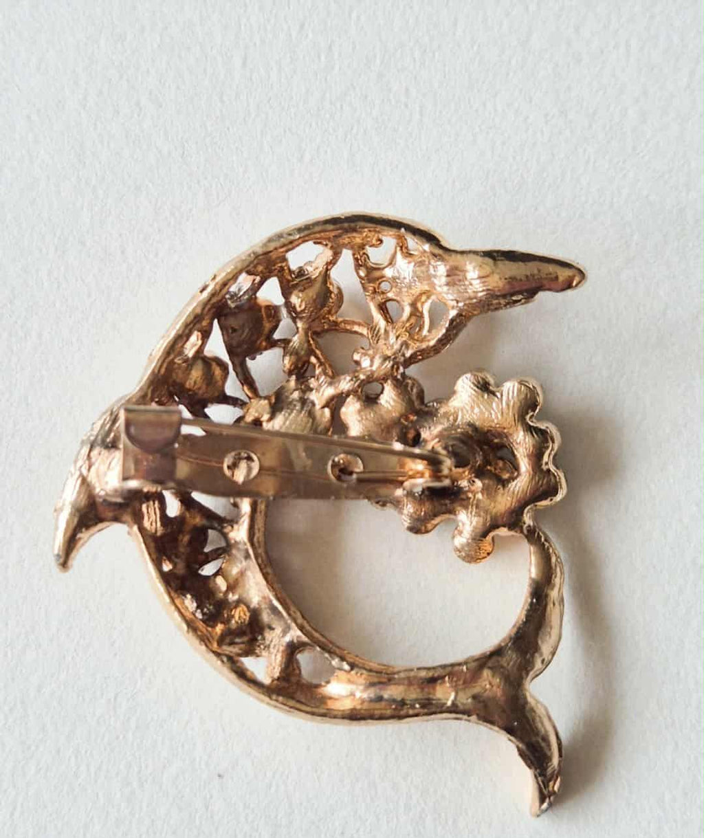 Vintažinė sagė delfinas