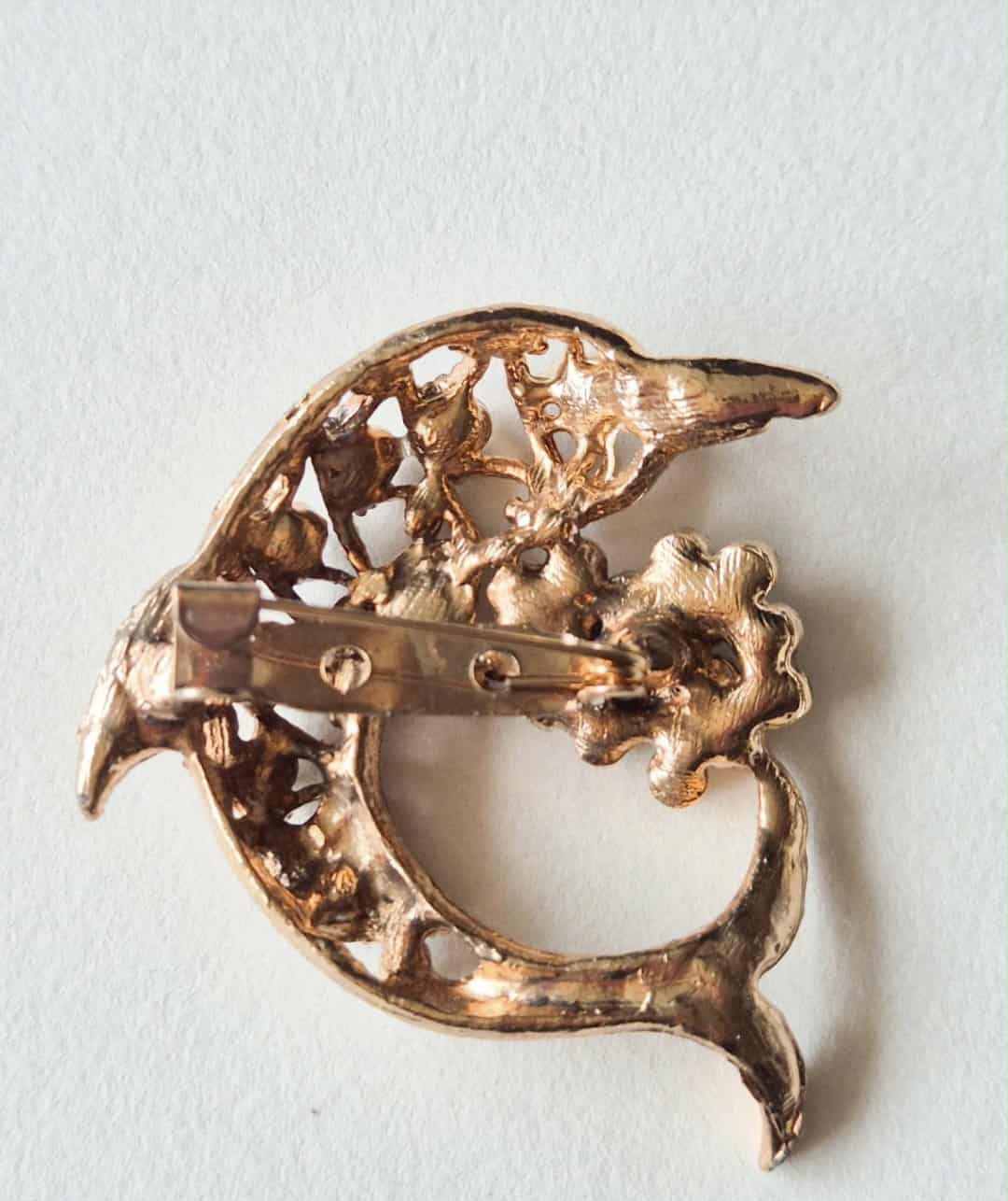 Vintažinė sagė delfinas