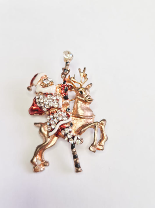 Kalėdinė sagė - Kalėdų Senelis ant elnio su kristalais