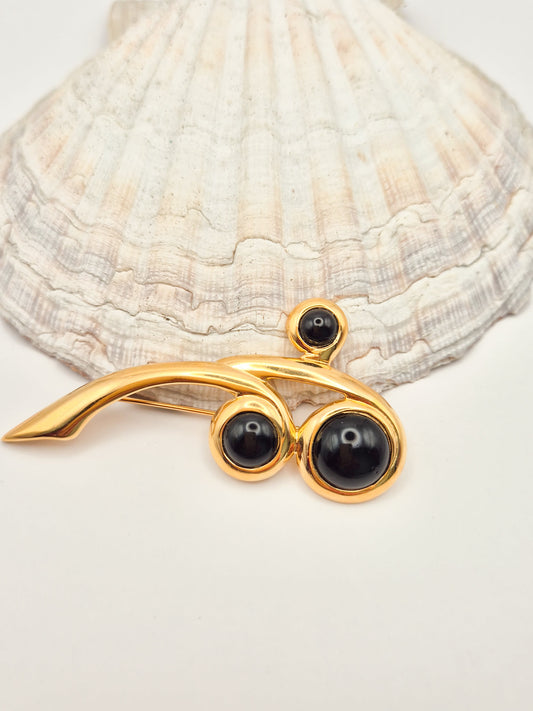 Vintažinė NAPIER sagė su juodais kabošonais