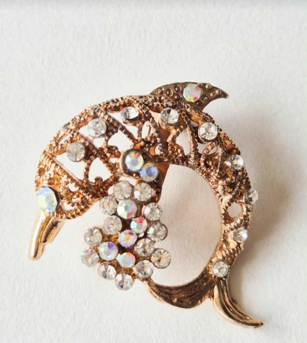 Vintažinė sagė delfinas