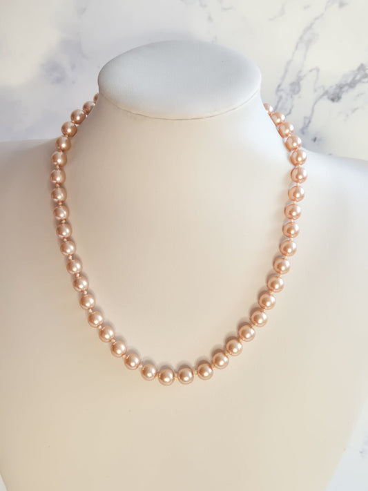 Vintažiniai rožiniai perlų karoliai, 44 cm ilgis, 1950-1970 m.